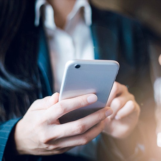 man holding his phone
