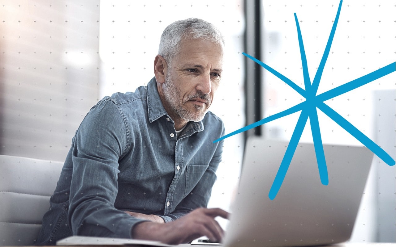 man watching laptop