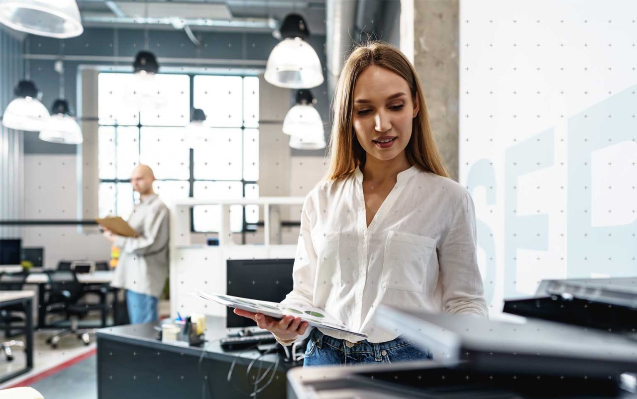 Woman behind desk